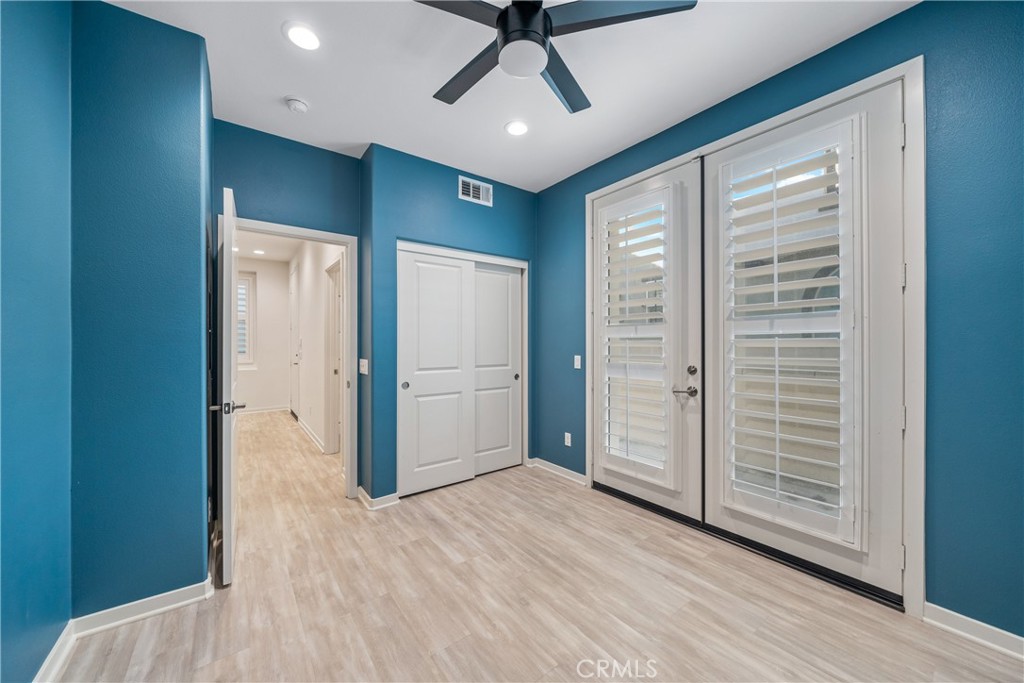 11082 Panoramic Drive Rancho Cucamonga, CA 91730 - Photo 13 of 48 a view of a livingroom with wooden floor and entryway