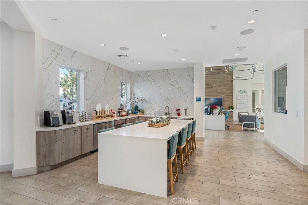 11082 Panoramic Drive Rancho Cucamonga, CA 91730 - Photo 43 of 48 a kitchen with sink and cabinets