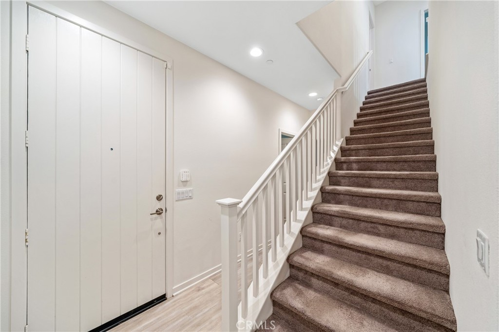11082 Panoramic Drive Rancho Cucamonga, CA 91730 - Photo 9 of 48 a view of entryway with wooden floor