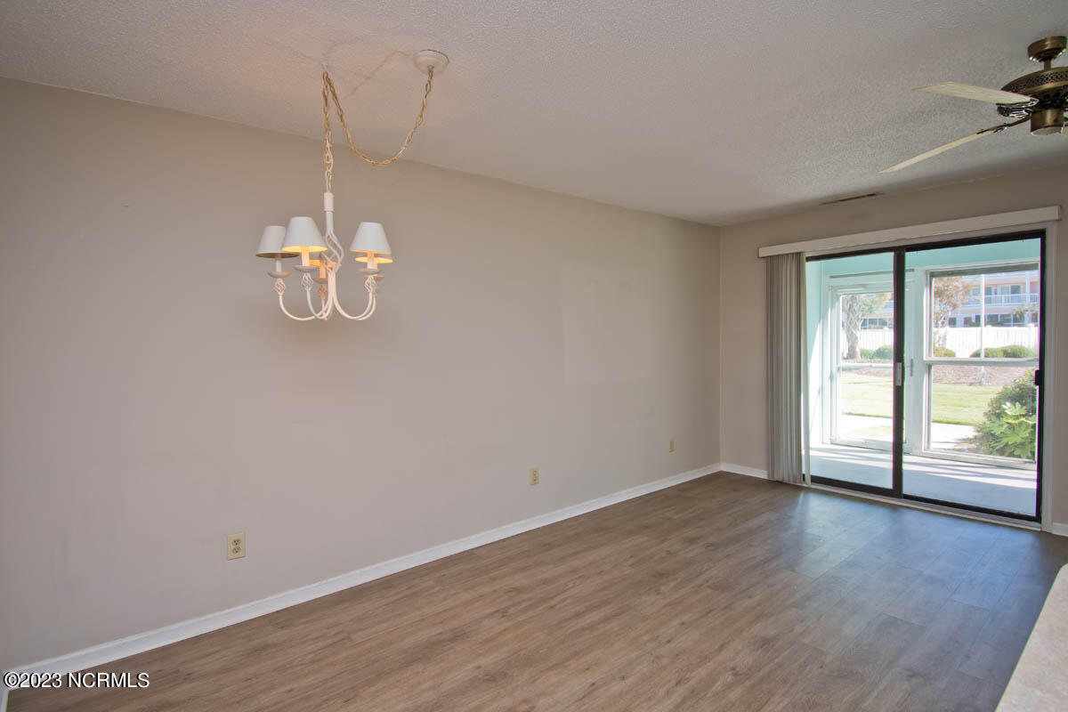 9201 Coast Guard Road, Unit G110 Emerald Isle, NC 28594 - Photo 5 of 33 Living/Dining room