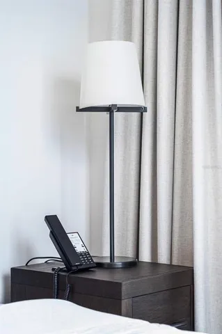 a bathroom with a mirror and a shower