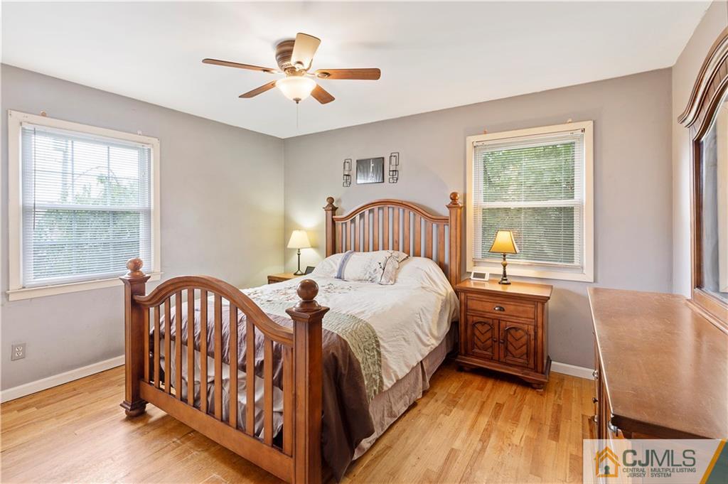 63 Daniel Street Carteret, NJ 07008 - Photo 12 of 20 a bedroom with a bed and a window