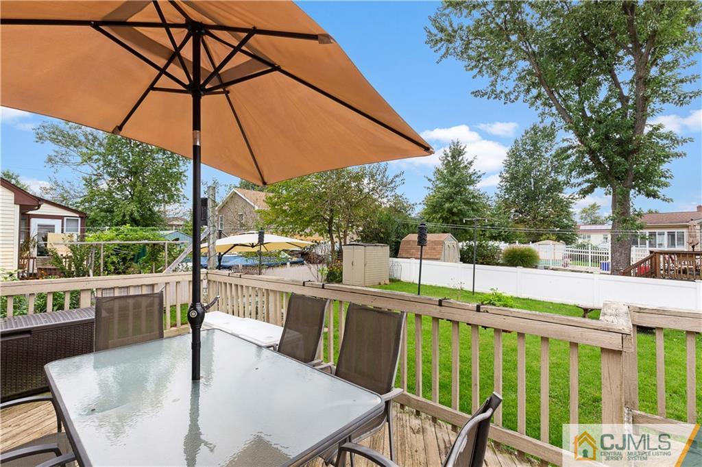 63 Daniel Street Carteret, NJ 07008 - Photo 18 of 20 a balcony view with a seating space