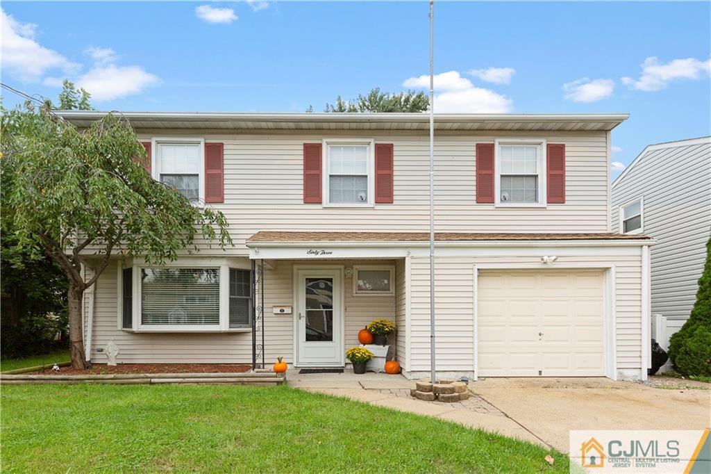 63 Daniel Street Carteret, NJ 07008 - Photo 20 of 20 front view of a house with a yard
