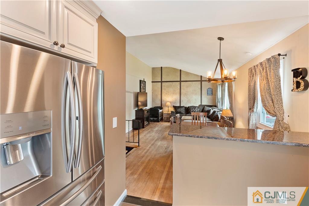 63 Daniel Street Carteret, NJ 07008 - Photo 4 of 20 a view of living room with furniture and floor to ceiling window
