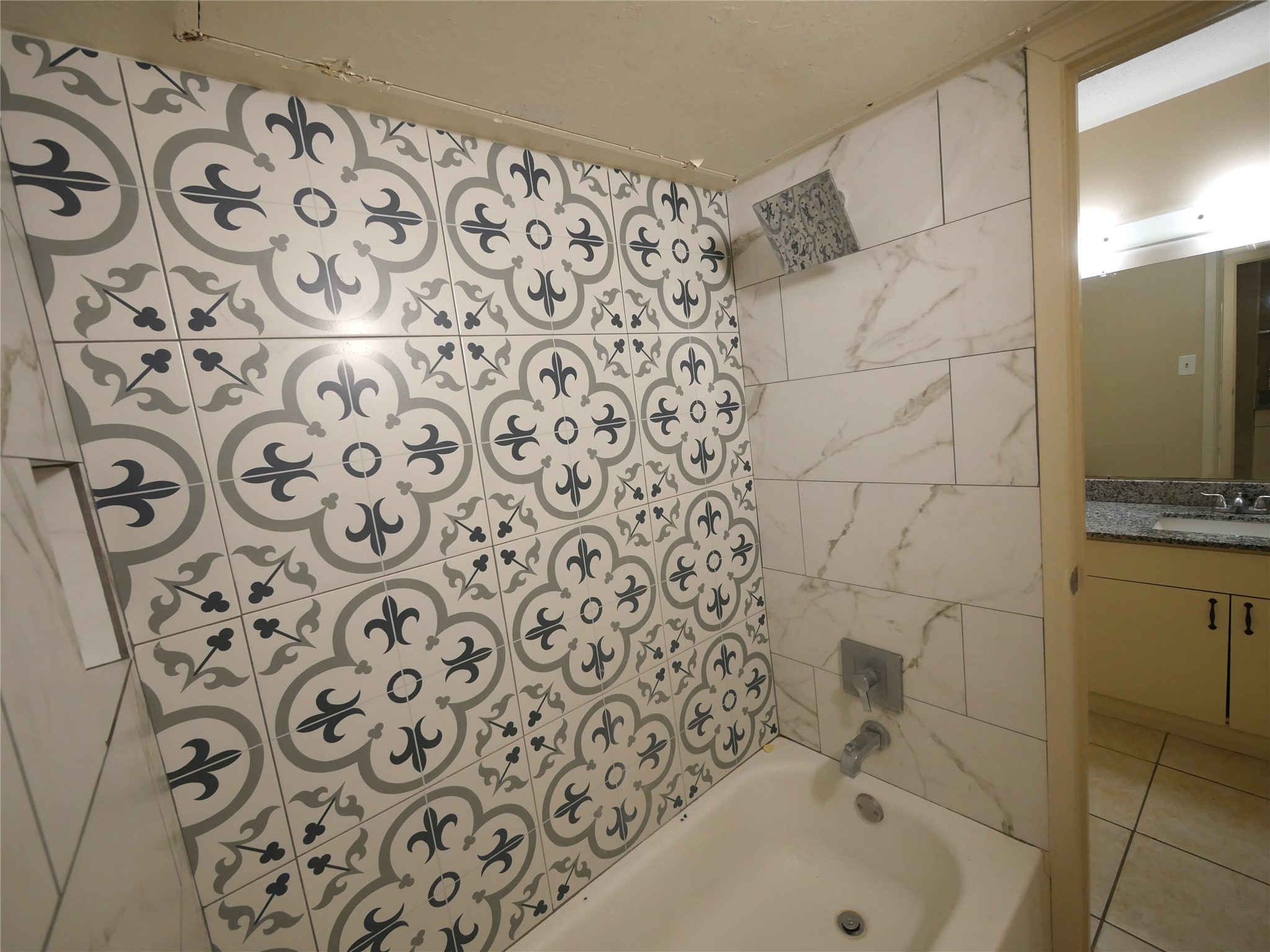 10100 South Gessner Road, Unit 202 Houston, TX 77071 - Photo 8 of 9 a bathroom with a bathtub and a sink