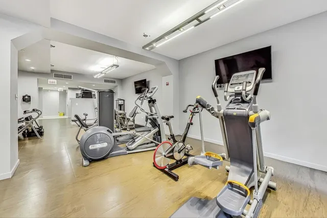 a view of a room with gym equipment