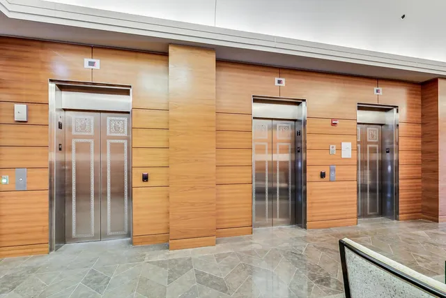 a view of a room with a large window