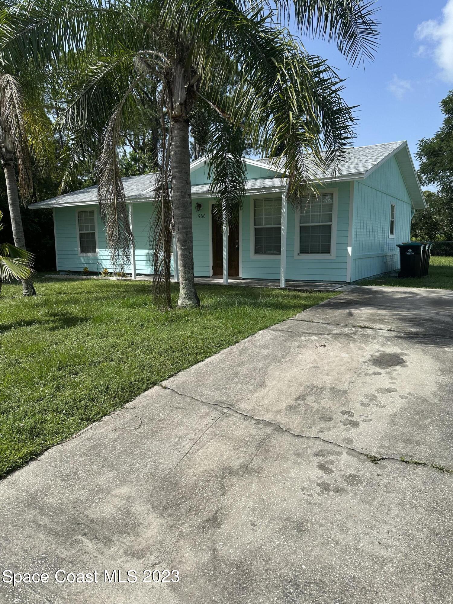 1566 Rainsville Road Southeast Palm Bay, FL 32909 - Photo 2 of 22 IMG-0847
