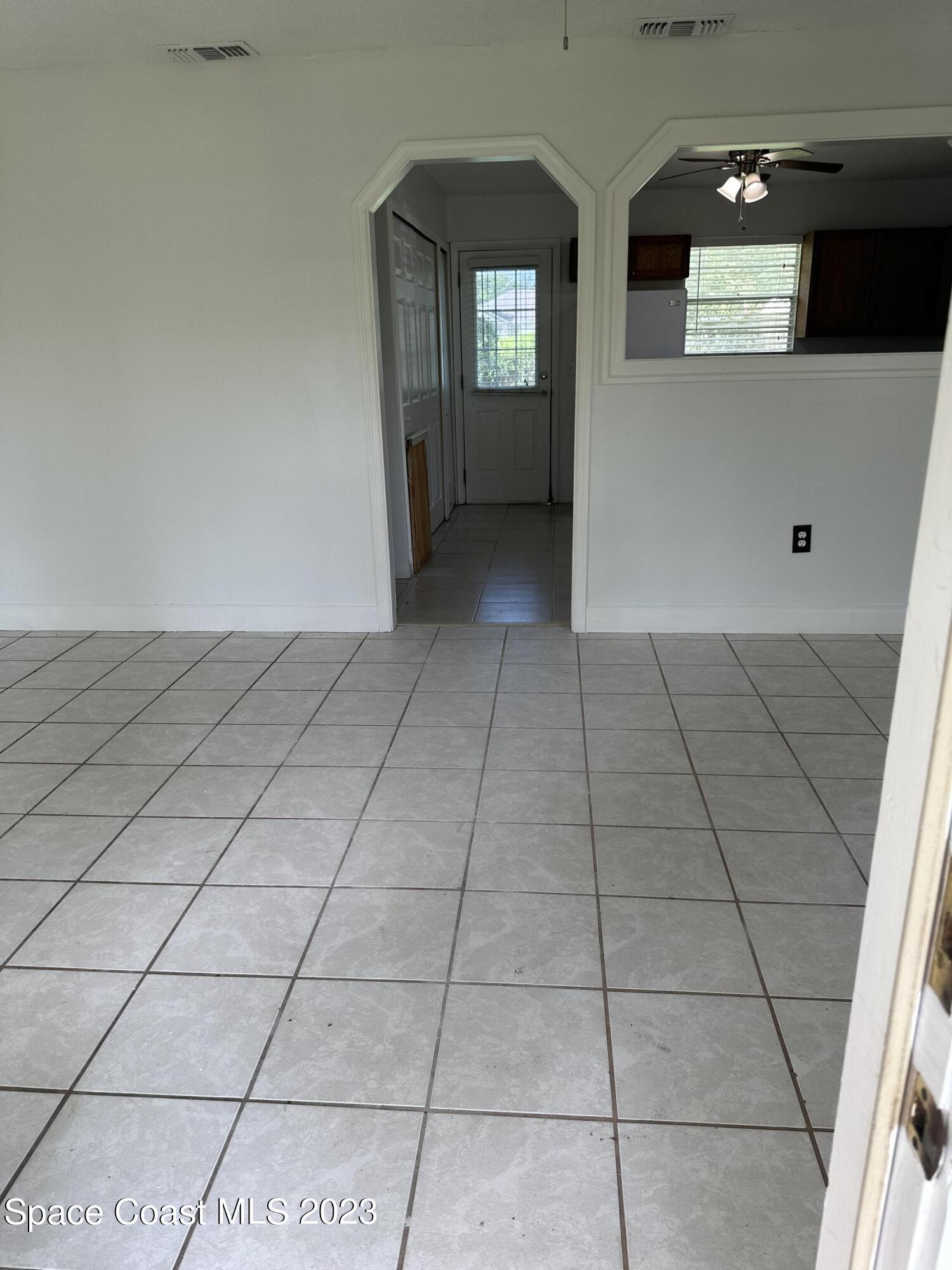 1566 Rainsville Road Southeast Palm Bay, FL 32909 - Photo 4 of 22 IMG-0850