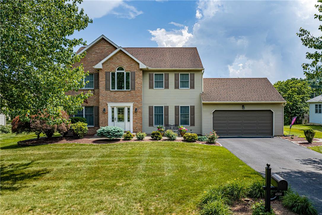 4568 Greenfield Road Bethlehem, PA 18017 - Photo 1 of 59 A well-maintained two-story home with a neat lawn and mature landscaping offers inviting curb appeal.