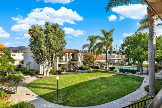 a view of a car parked in front of a house