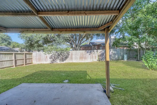 a view of a backyard with a slide