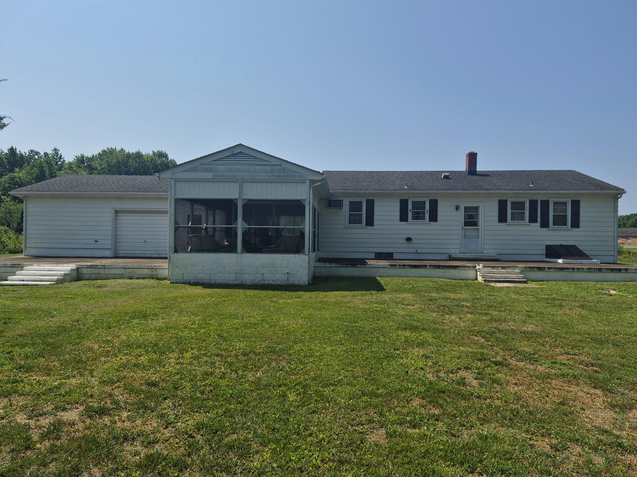 1043 Camp Road Denton, MD 21629 - Photo 11 of 17 Rear deck and porch for entertaining.