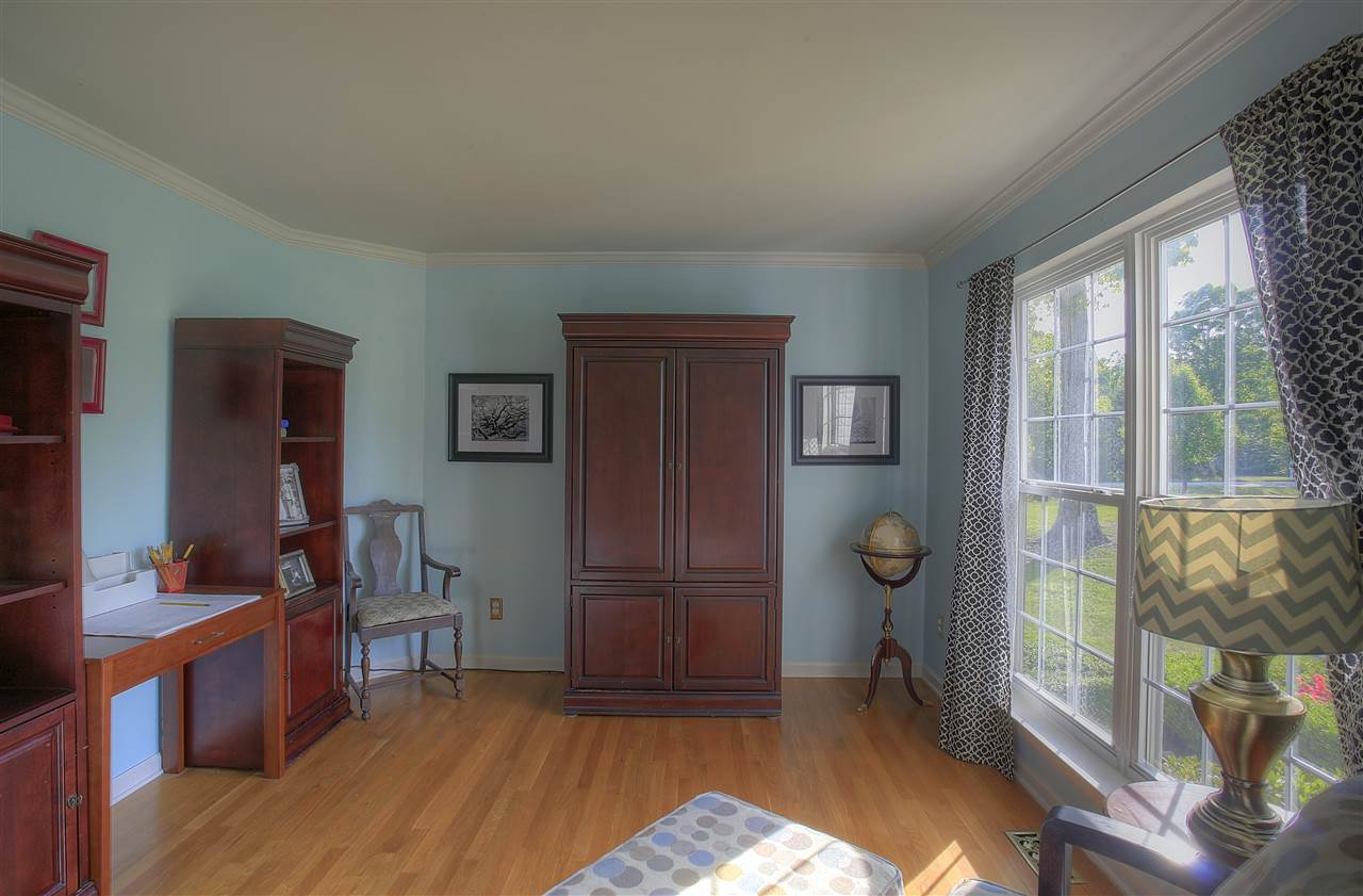 153 Deerview Road Keswick, VA 22947 - Photo 15 of 31 a bedroom with furniture and a window