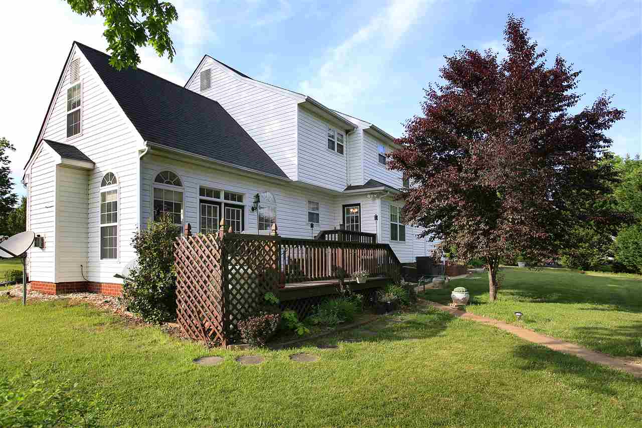 153 Deerview Road Keswick, VA 22947 - Photo 6 of 31 a front view of a house with a yard