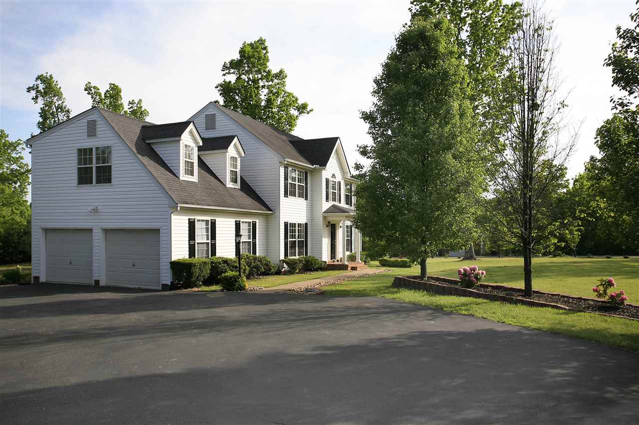 153 Deerview Road Keswick, VA 22947 - Photo 10 of 31 a front view of a house with a yard