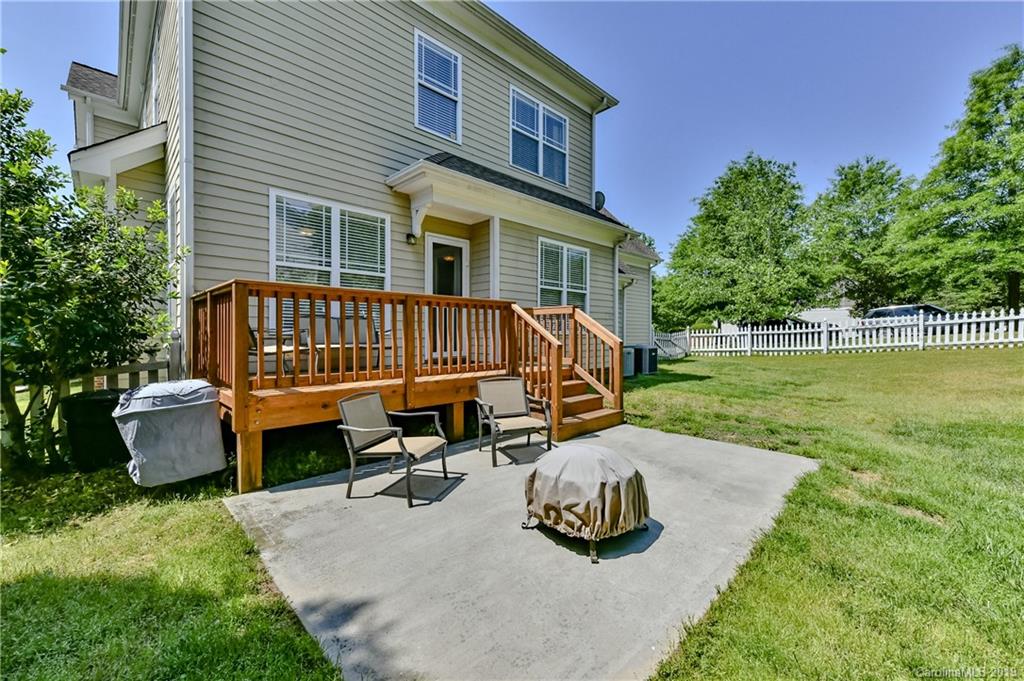 1036 Hunters Run Drive Tega Cay, SC 29708 - Photo 31 of 35 a view of a patio with a yard