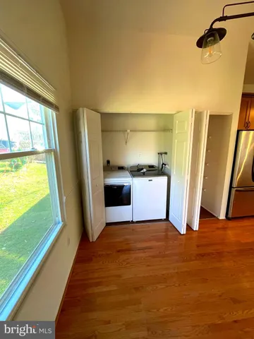 a view of a kitchen with a sink