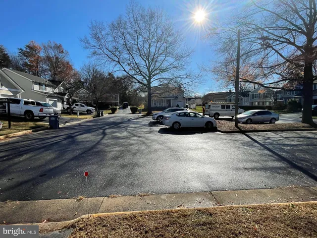 a view of a street with houses