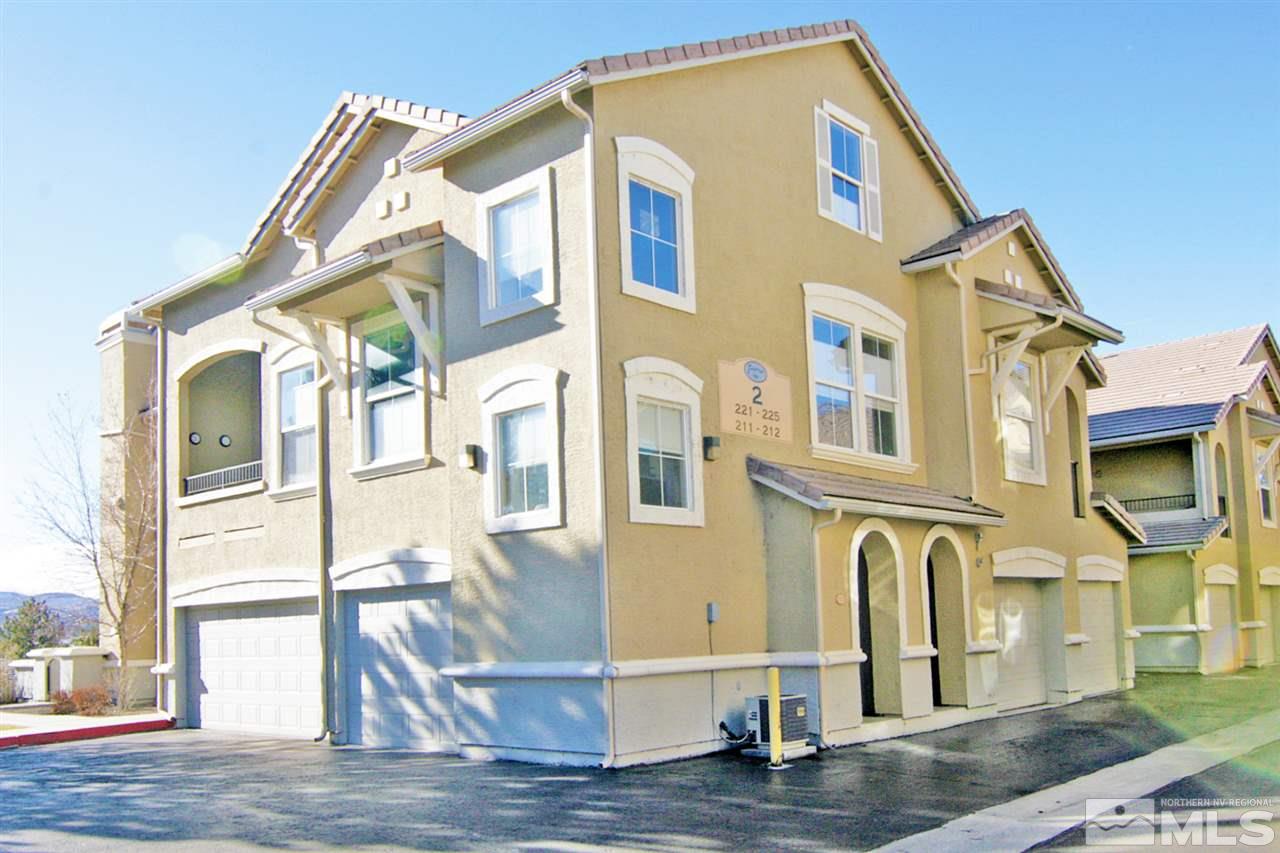 9050 Double R, Unit 225 Reno, NV 89521 - Photo 1 of 29 a view of a brick house with many windows