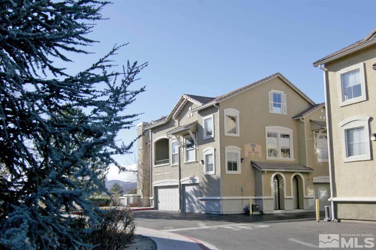 9050 Double R, Unit 225 Reno, NV 89521 - Photo 2 of 29 a front view of a building with parking