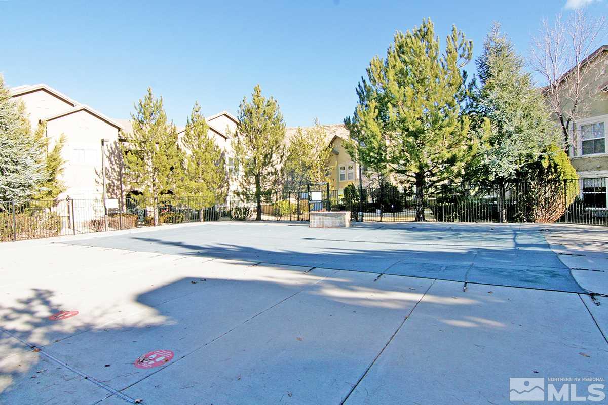 9050 Double R, Unit 225 Reno, NV 89521 - Photo 25 of 29 a view of swimming pool with an outdoor space