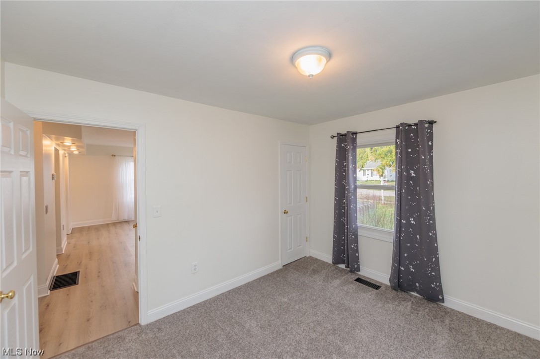 355 Dellwood Road Avon Lake, OH 44012 - Photo 18 of 35 Empty room with light hardwood flooring