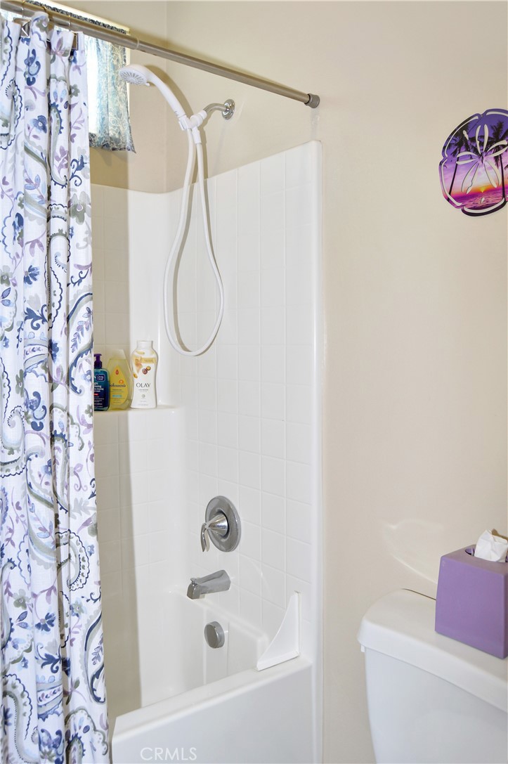 166 Fox Lane Calimesa, CA 92320 - Photo 50 of 76 2nd Full Bath with Dual Sinks, Privacy Door to Water Closet, and Tub/Shower Combo