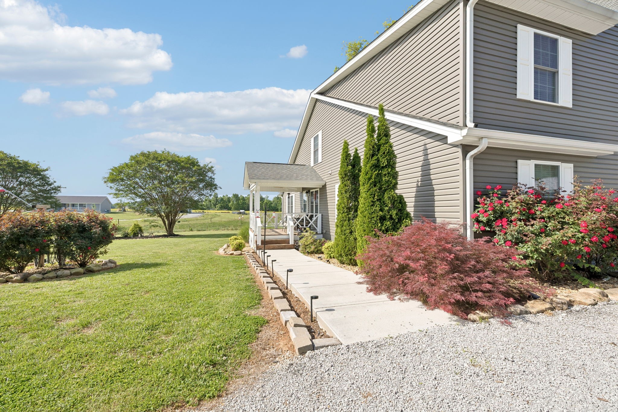 403 Bland Road Estill Springs, TN 37330 - Photo 38 of 66 a view of a house with backyard and sitting area