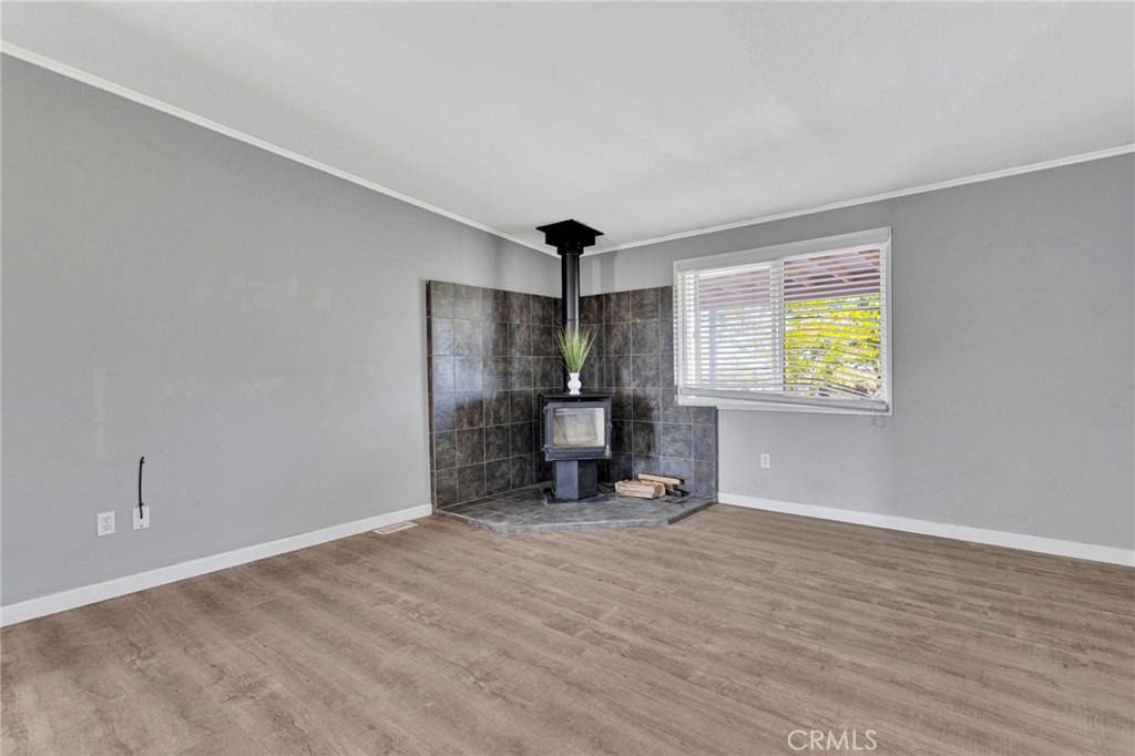 8074 Mira Mar Road Phelan, CA 92371 - Photo 13 of 49 a big room with windows and closet