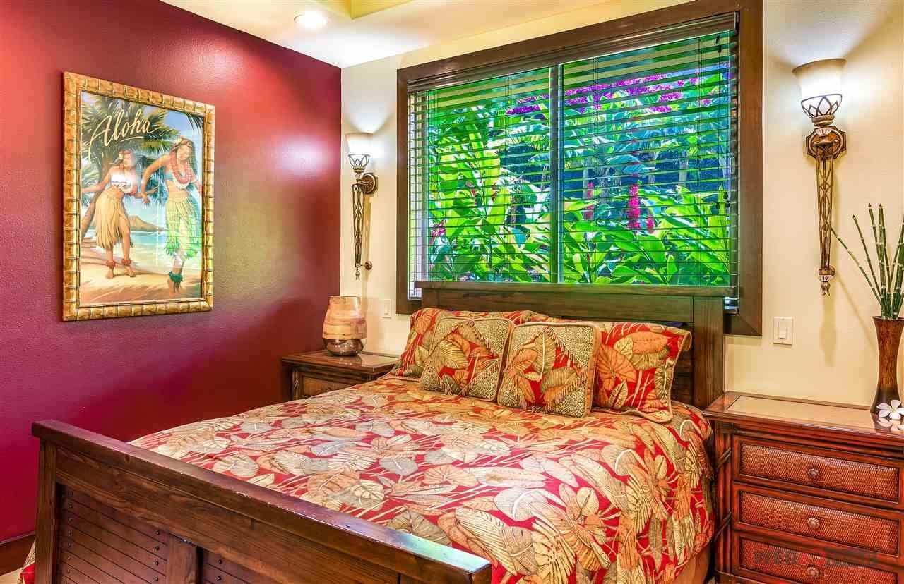 52 Lau Niu Way, Unit A Lahaina, HI 96761 - Photo 14 of 28 a bedroom with a bed and a window
