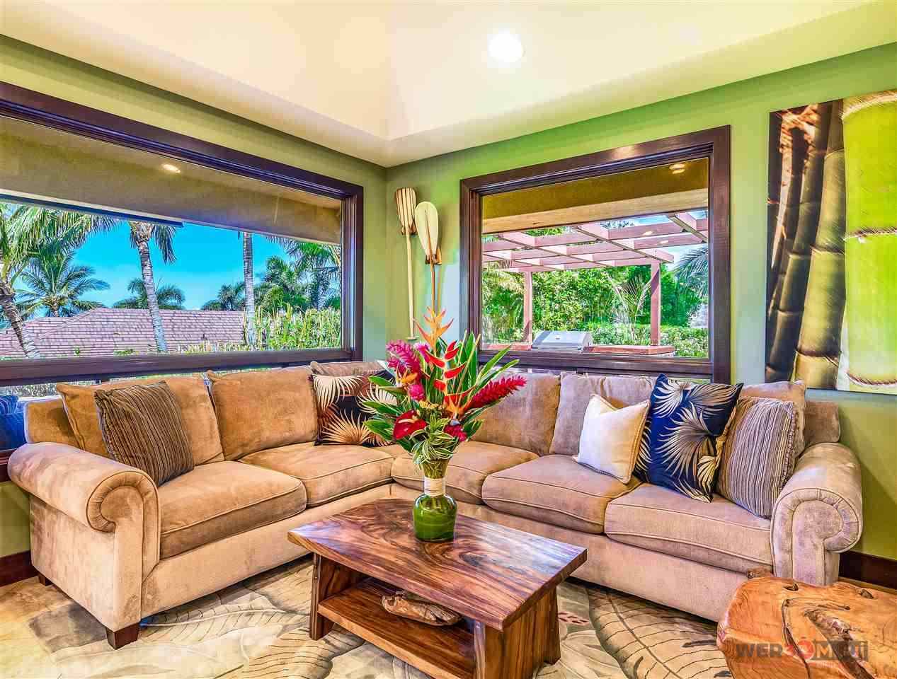 52 Lau Niu Way, Unit A Lahaina, HI 96761 - Photo 7 of 28 a living room with furniture and a large window