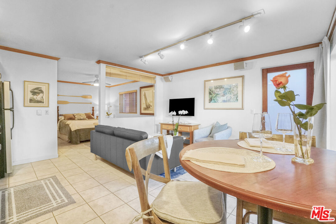 120 Fleet Street, Unit C Marina del Rey, CA 90292 - Photo 6 of 23 a living room with furniture and flat screen tv