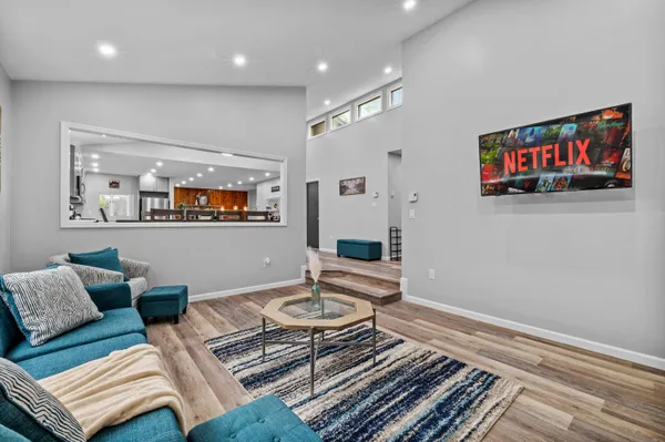 a view of a dining room with furniture window and outside view