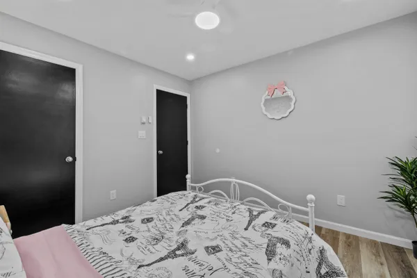 a bathroom with a shower and a toilet