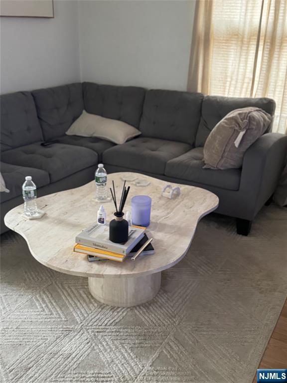 89 Ivy Street Kearny, NJ 07032 - Photo 5 of 14 a living room with furniture and a window