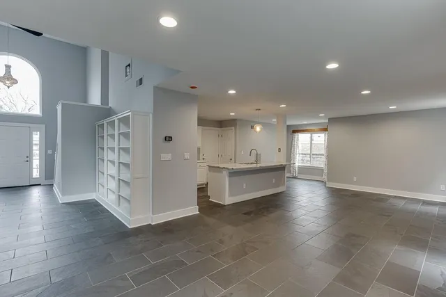 a view of kitchen with furniture and window