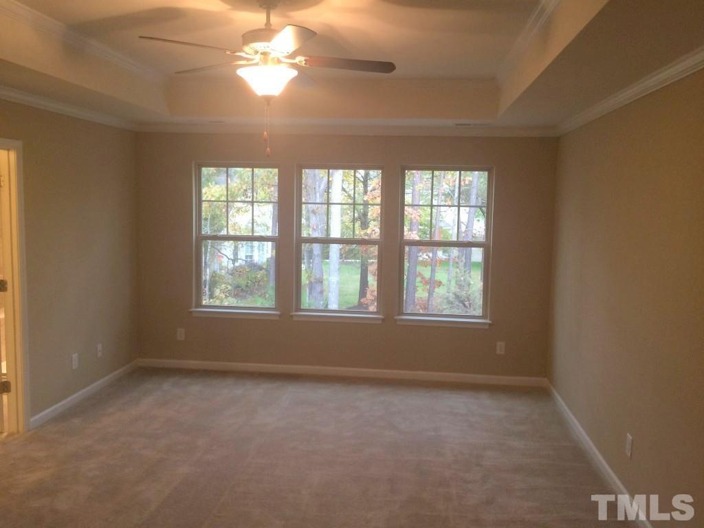3916 Cary, NC 27519 - Photo 11 of 16 an empty room with a window