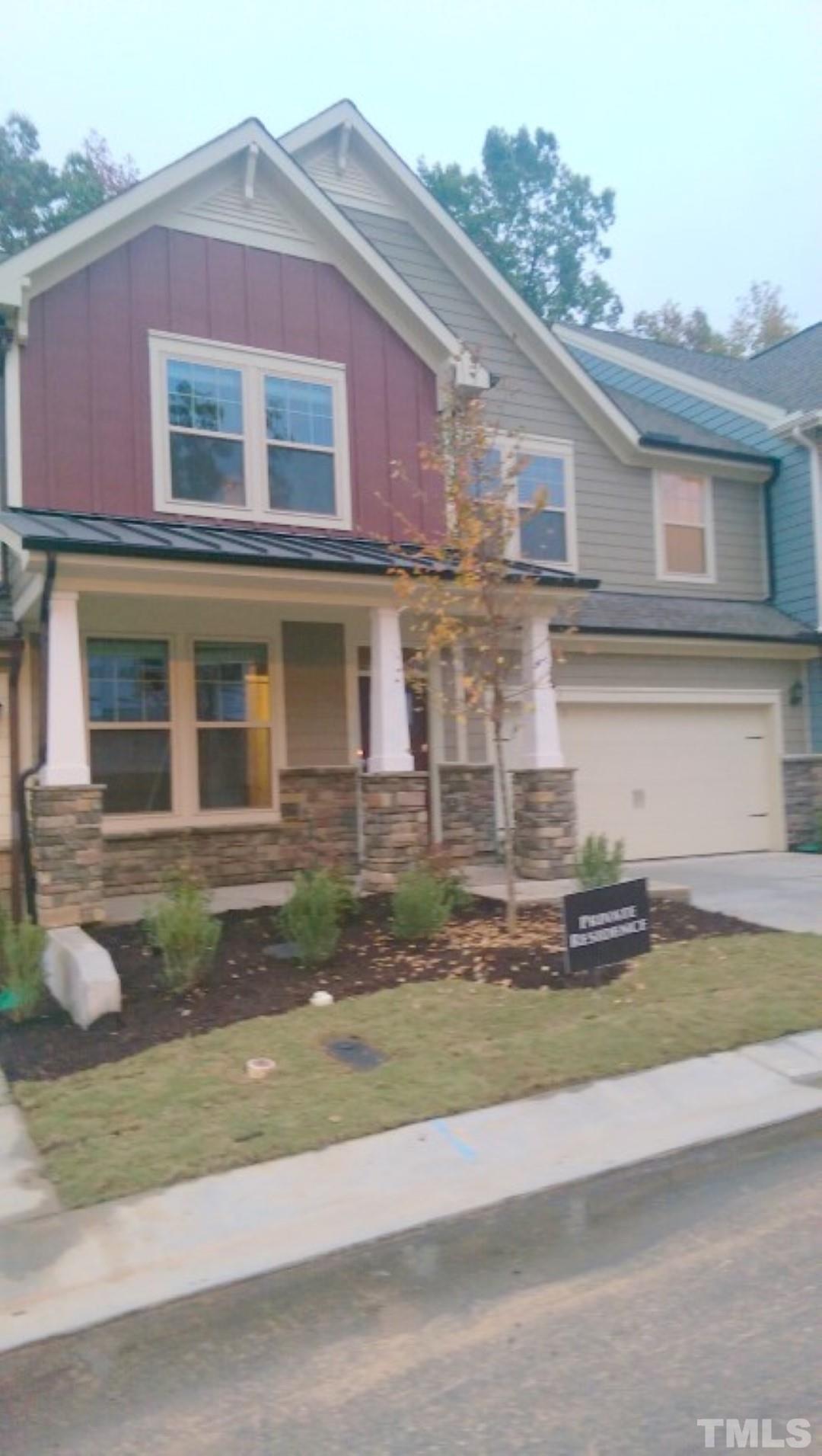 3916 Cary, NC 27519 - Photo 3 of 16 a front view of a house with a yard