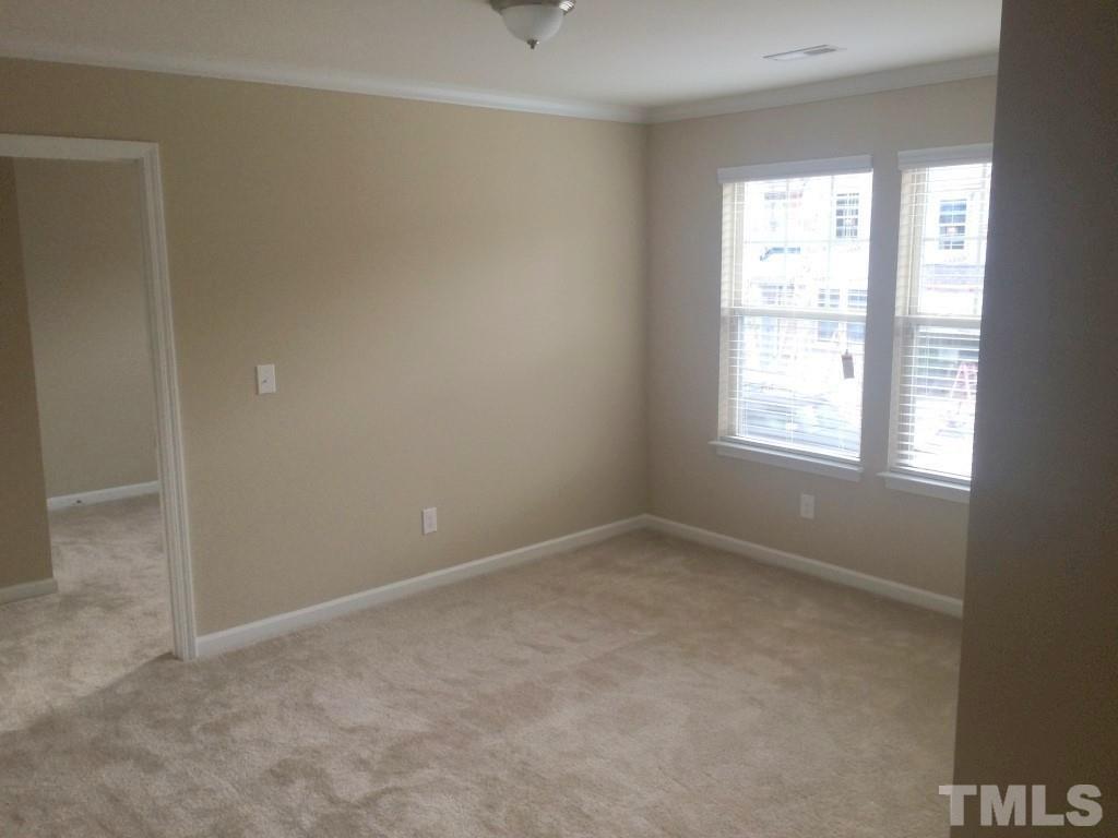 3916 Cary, NC 27519 - Photo 10 of 16 an empty room with a window