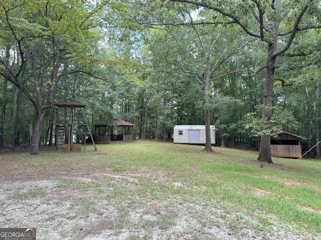 a view of a wooden deck with a bench