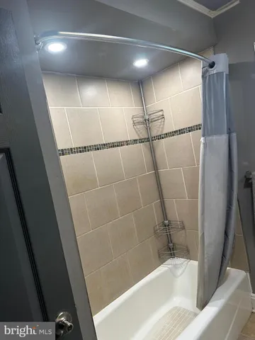 a bathroom with a bathtub