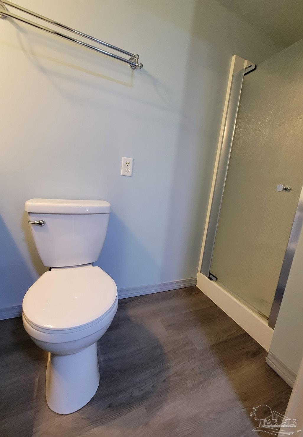 3217 Wallace Lake Road Pace, FL 32571 - Photo 15 of 17 a bathroom with a toilet and a sink