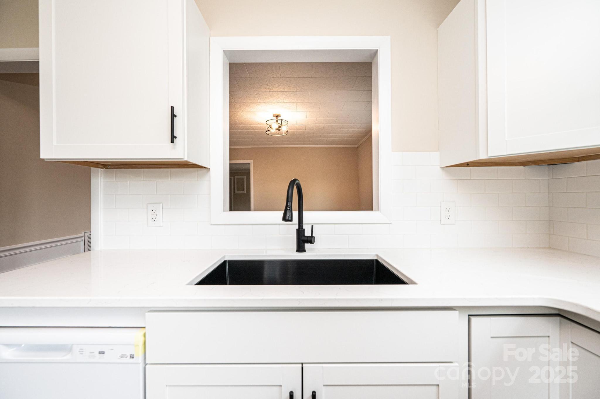 210 West 15th Street Newton, NC 28658 - Photo 18 of 43 a sink with a window