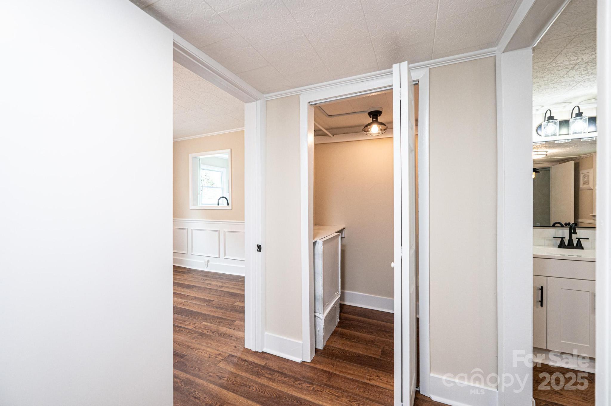 210 West 15th Street Newton, NC 28658 - Photo 25 of 43 a view of a bathroom with a sink and mirror