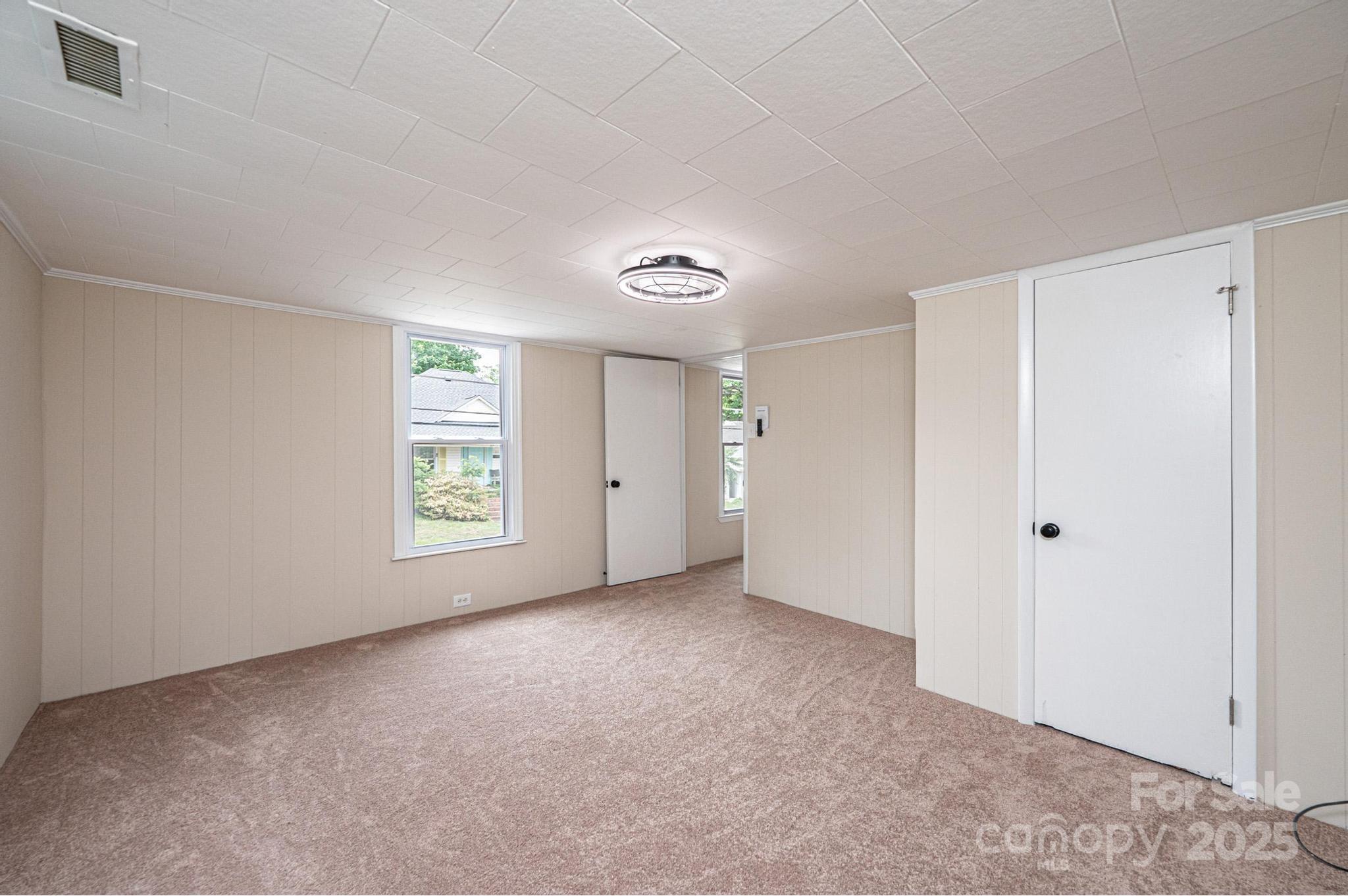 210 West 15th Street Newton, NC 28658 - Photo 34 of 43 a view of an empty room with a window