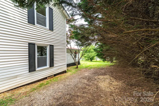 a view of a backyard with stairs