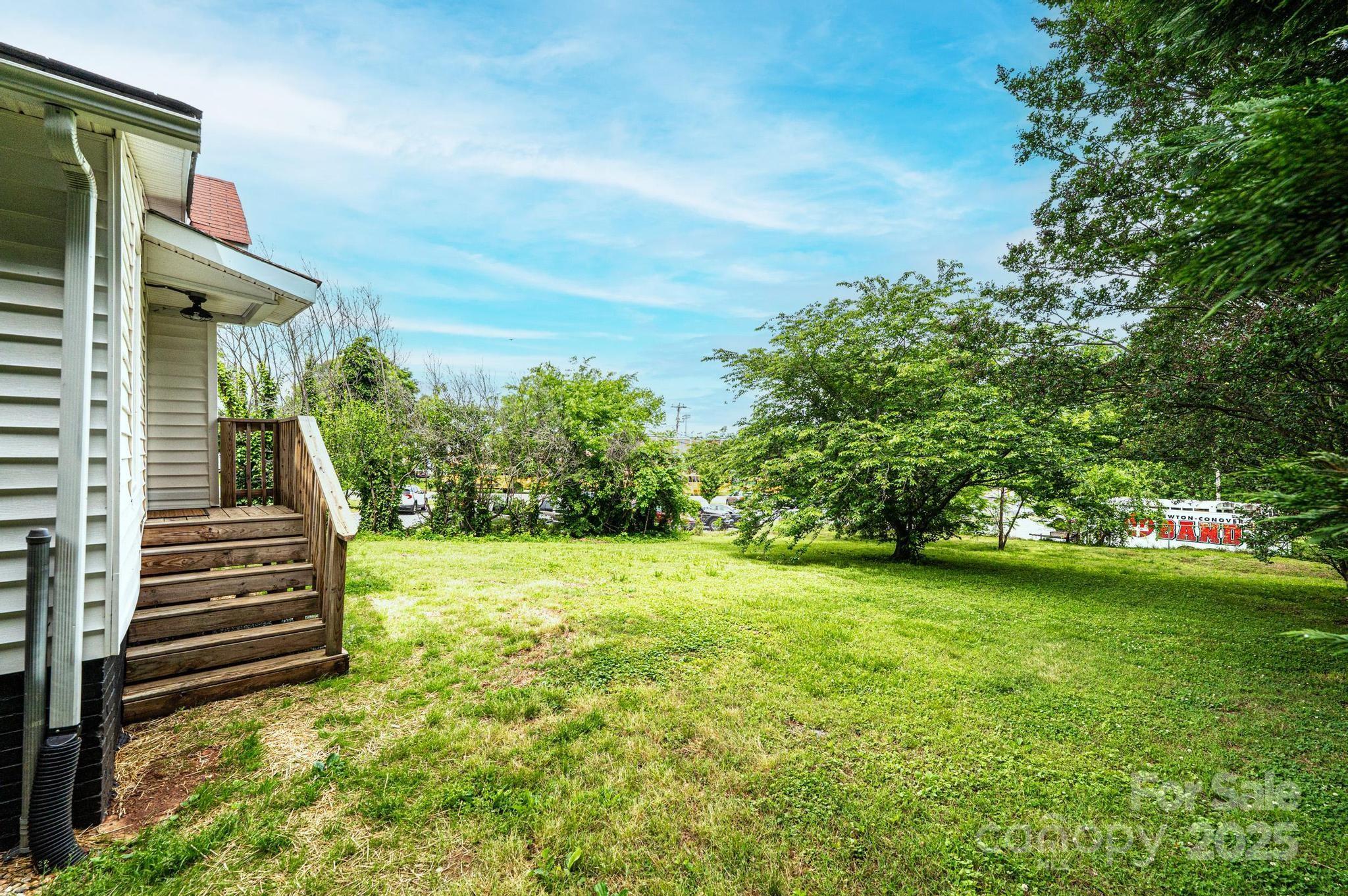 210 West 15th Street Newton, NC 28658 - Photo 42 of 43 a view of a backyard with stairs
