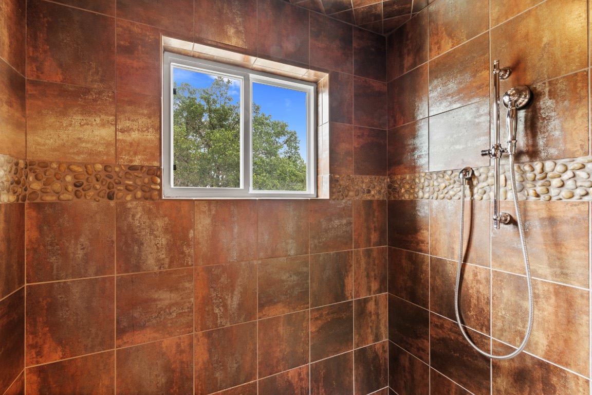 2321 Gentry Creek Road Menard, TX 76859 - Photo 22 of 35 a bathroom with a shower